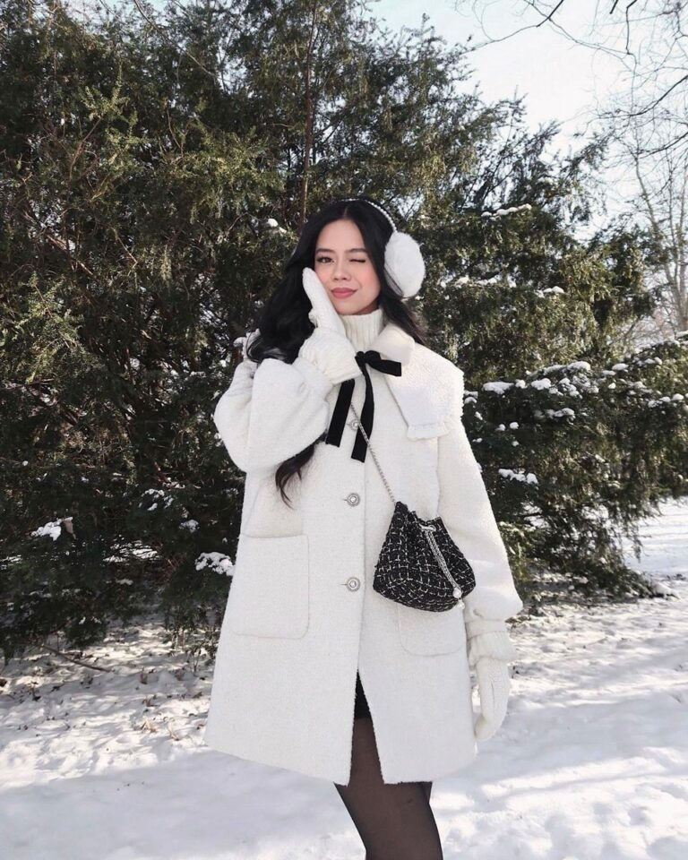Chic White Coat with Luxe Accessories