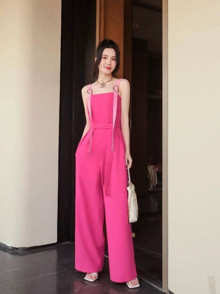 Bold Pink Jumpsuit with Statement Jewelry