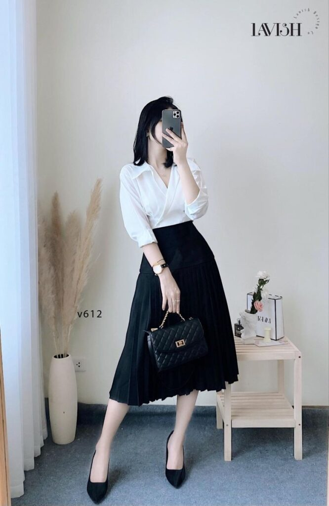 Classic White Blouse and Black Pleated Skirt