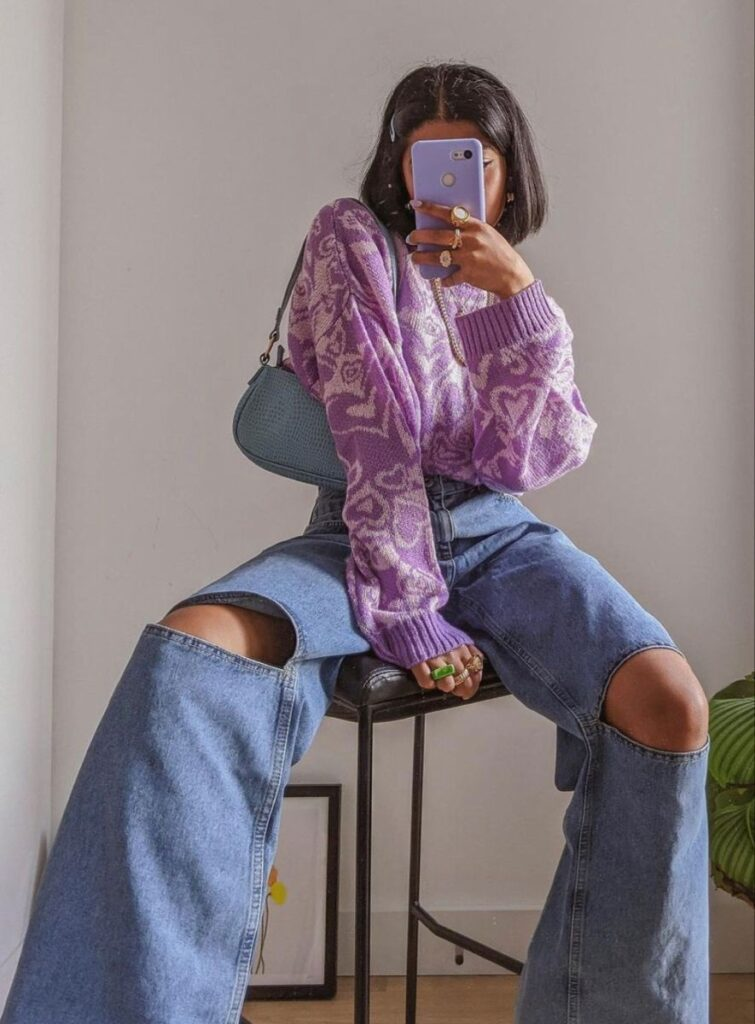 Purple Patterned Sweater with Ripped Jeans