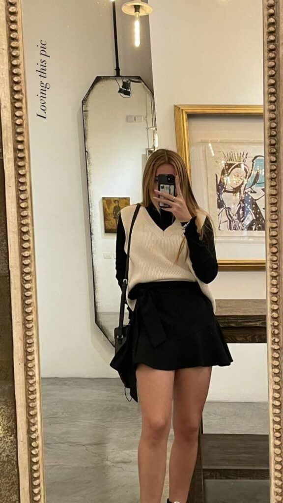Cream Sweater with Black Mini Skirt