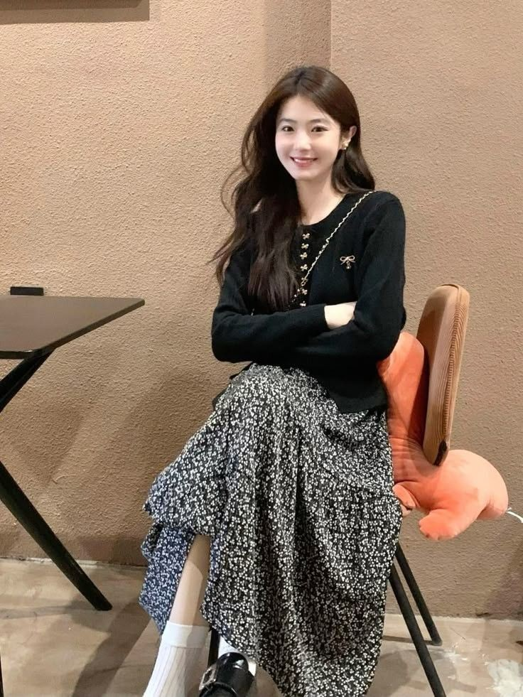 Black Sweater and Patterned Midi Skirt