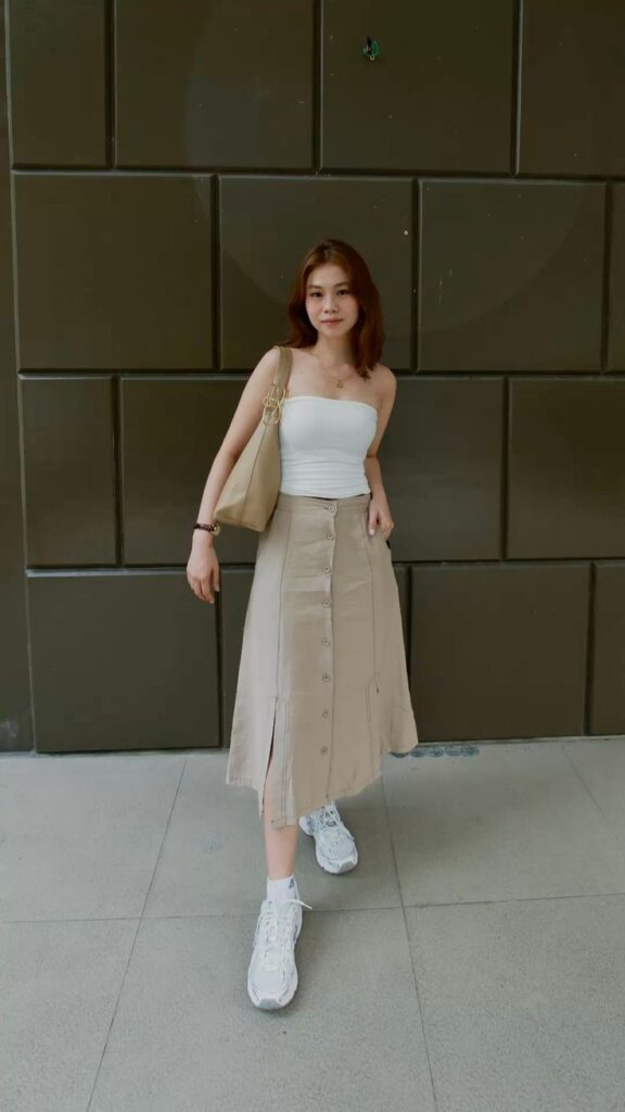Neutral Midi Skirt With White Sneakers