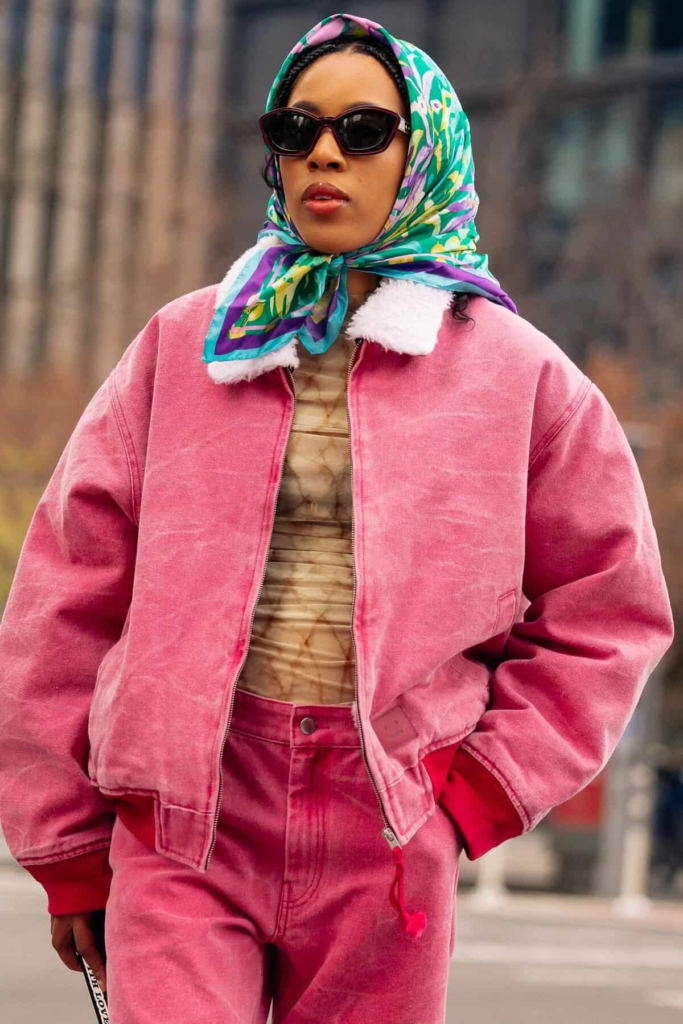 Vibrant Pink Bomber with Patterned Scarf