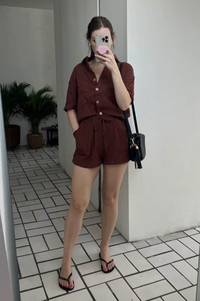 Rust-Colored Linen Romper with Flip-Flops