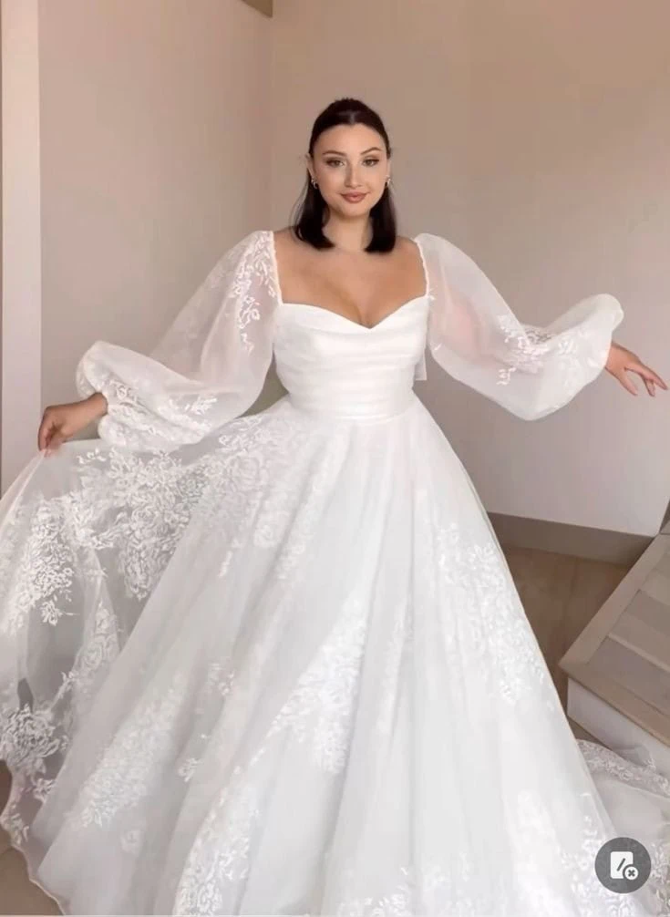 Elegant Ball Gown with Sheer Embellished Cape